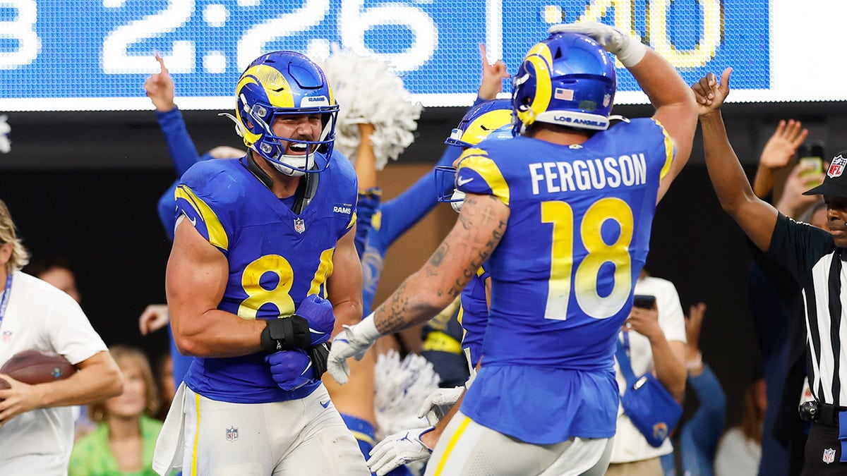 Colby Parkinson celebrates with Terrance Ferguson