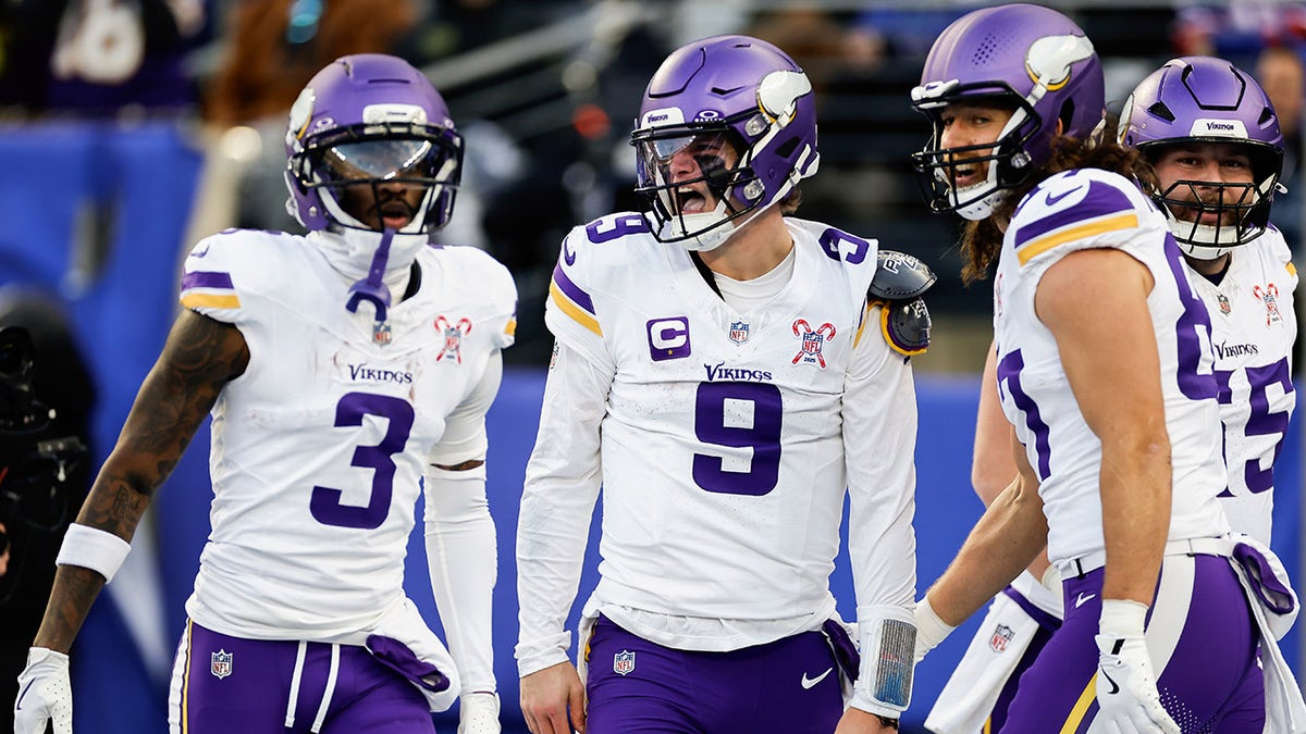 JJ McCarthy celebrates