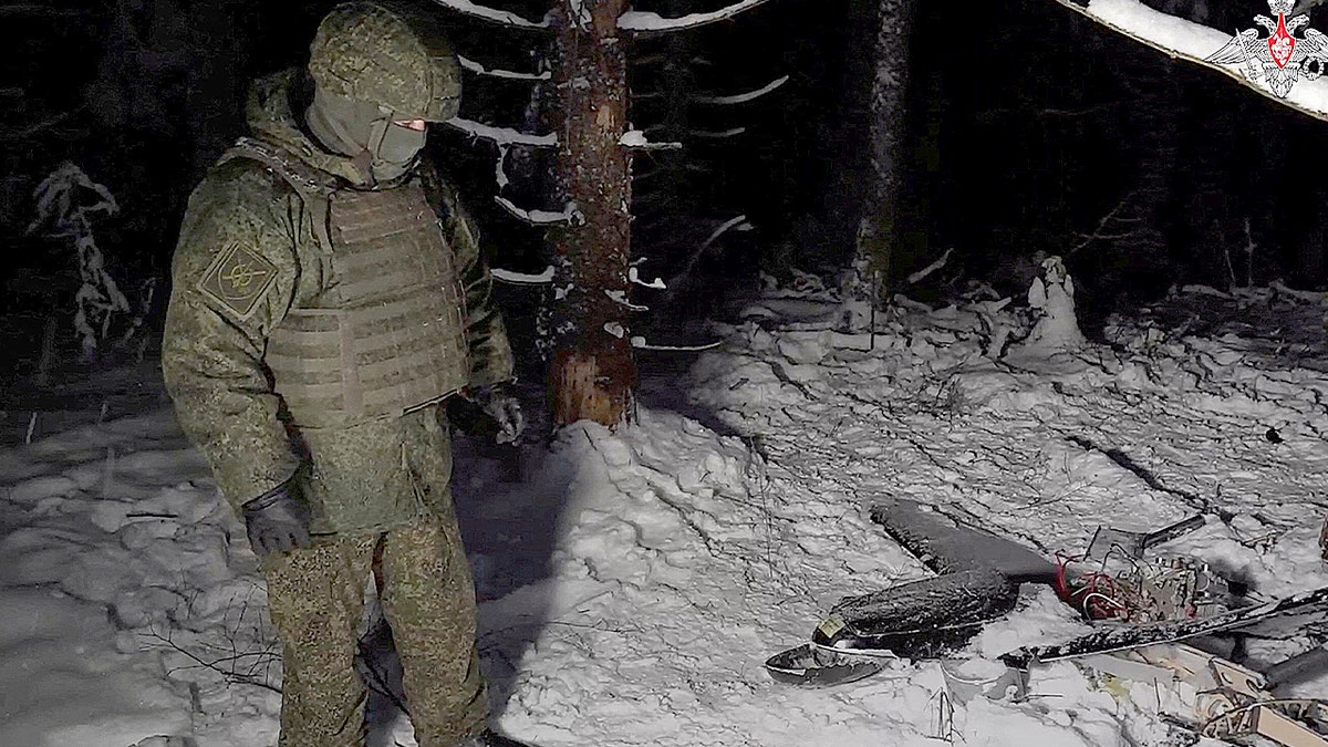 drone and russian serviceman