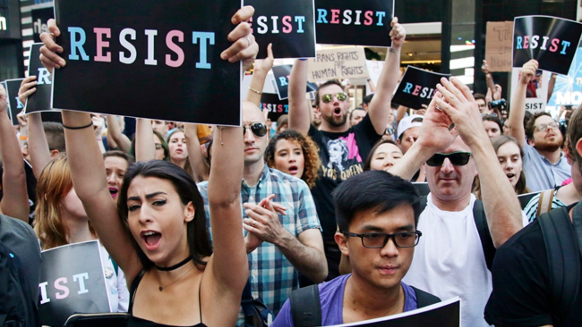 Protesters attend a rally in NYC