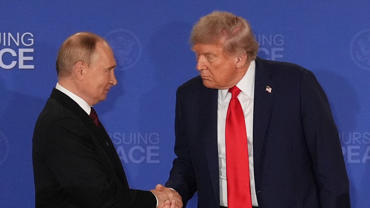 Trump shaking Putin's hand in Alaska in August