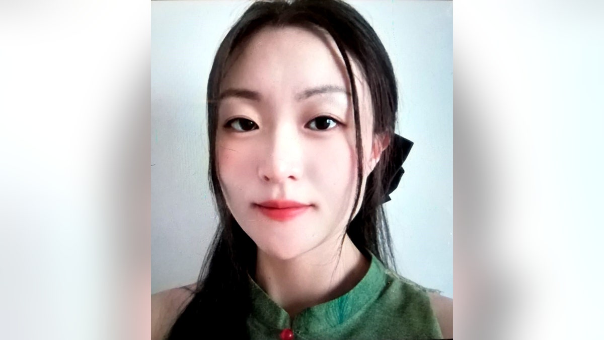 Zhe Wang posing for photo