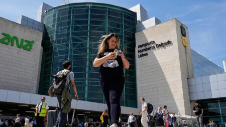 Why are soldiers reinforcing border control at Lisbon Airport?
