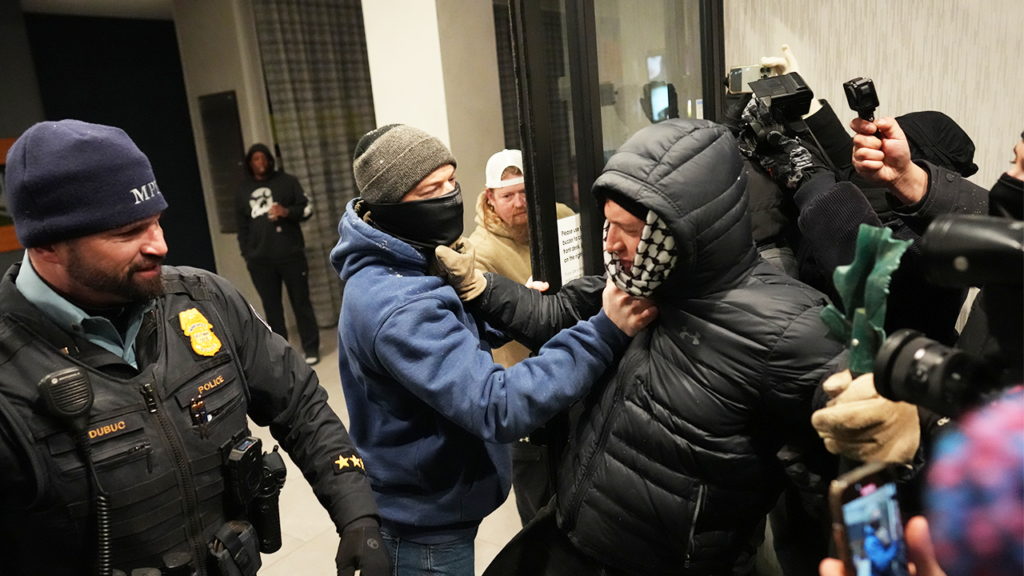 Anti-ICE agitators clash with federal agents at Minneapolis hotel, as agents deploy tear gas, flashbangs
