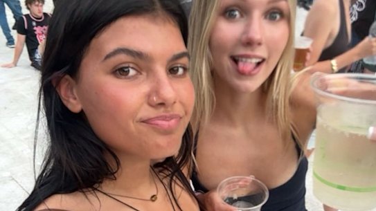 Piper James (left) at an AC/DC concert in Australia with her Canadian travelling companion.