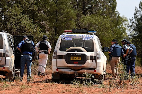 Police prepare to search a property at Mount Hope after a possible sighting of Julian Ingram.