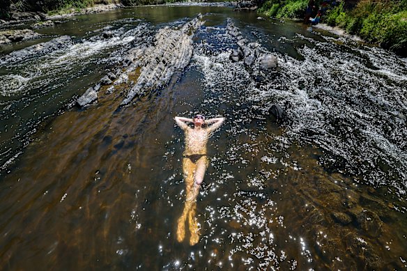 Jack Traylen cools off in the Yarra. Traylen is from Melbourne but lives in Finland, where it is currently minus 15 degrees.