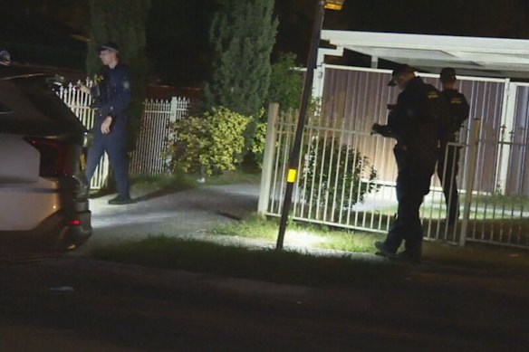 Officers combing the scene after shutting down a house party.