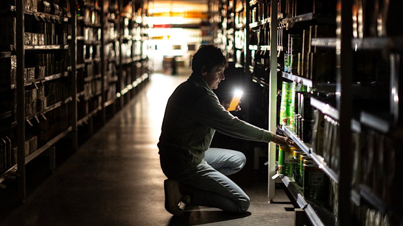 Locals shop by torchlight as Yea suffers blackout; family shelters in shipping container
