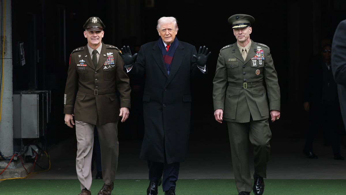 President Trump walks onto the field at the Army vs. Navy game