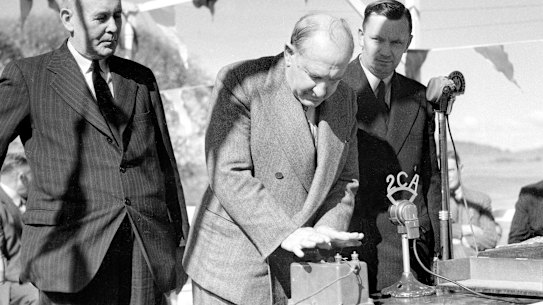 Governor General William McKell detonates the first explosives at the launch of the Snowy Mountains Hydro Electric Scheme on 17 October 1949.