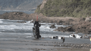 More than a dozen cars winched from the water, a week after being swept away