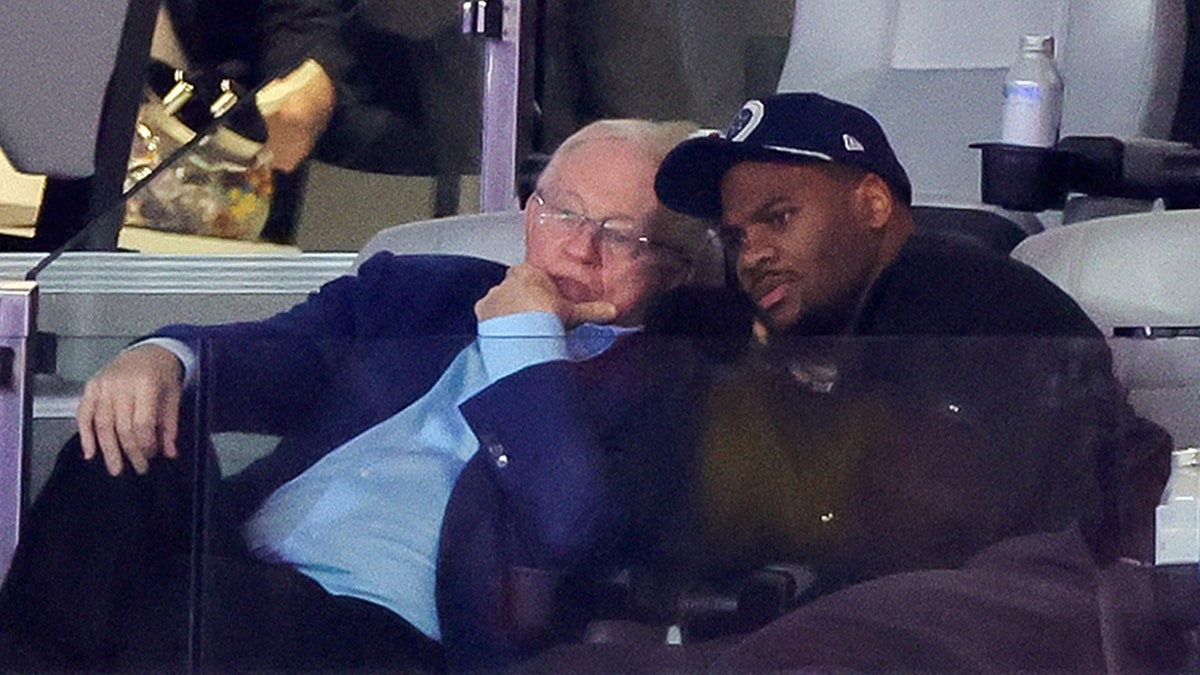 Jerry Jones and Micah Parsons in a suite