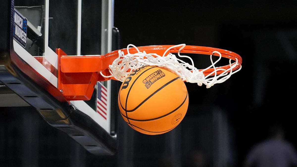 Basketball goes through net