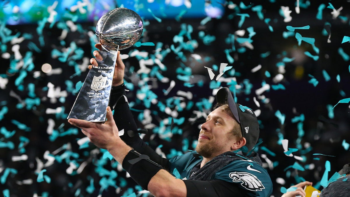 Nick Foles holds the Vince Lombardi Trophy