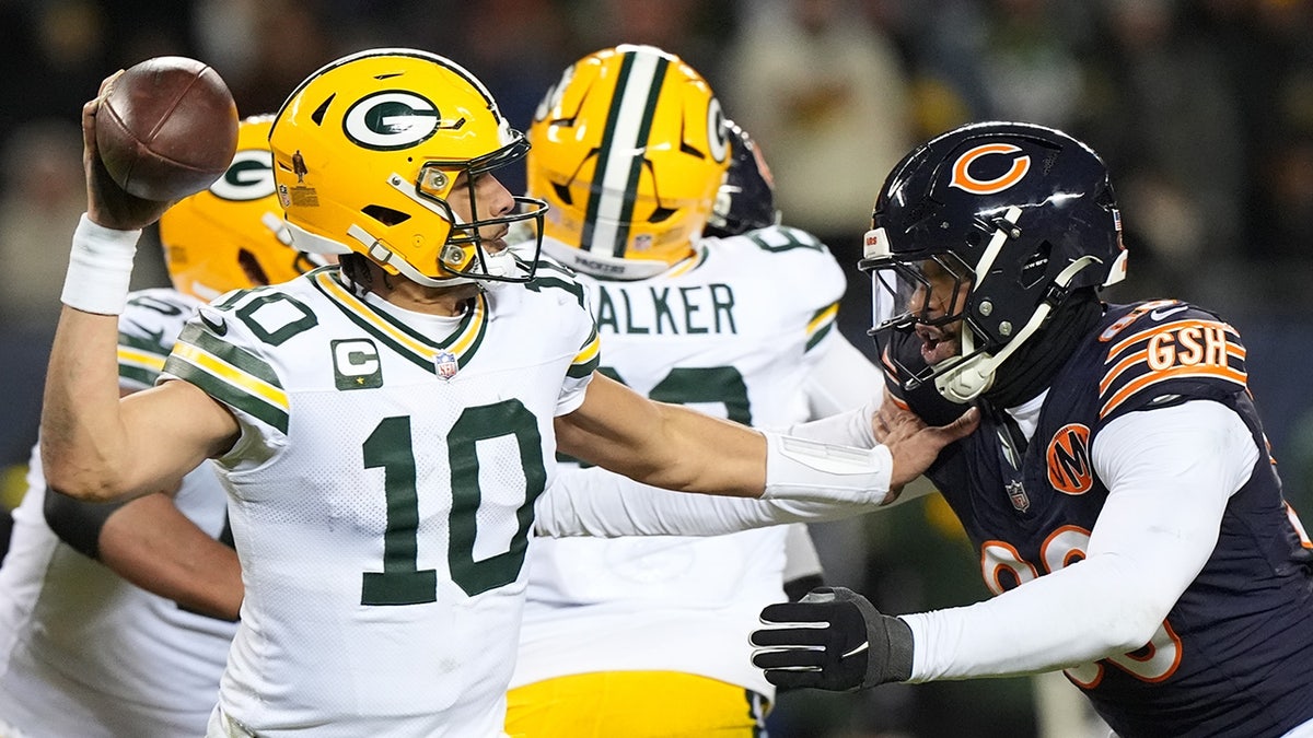 Jordan Love throws the ball