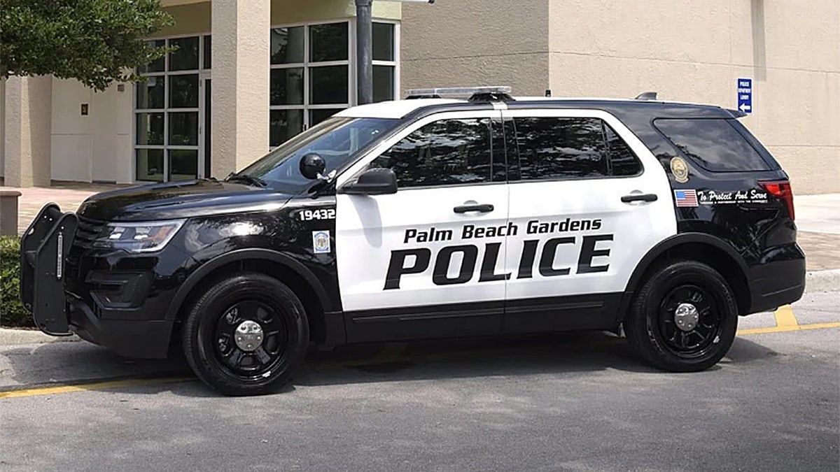 Palm Beach Gardens Police Department vehicle outside building
