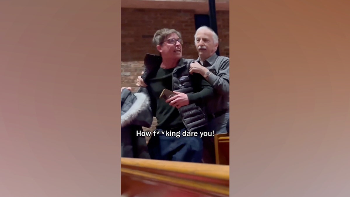 protester-ny-tom-suozzi