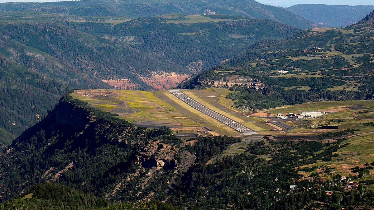 A single runway at regional airport in mountainous area