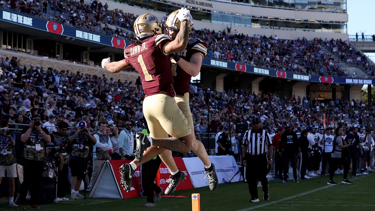 Texas State football players celebrate