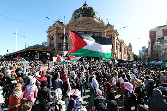 Protesters outside Flinders Street Station on Thursday.