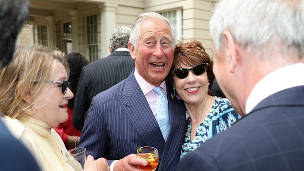 Rubbing royal shoulders: Prince Charles (now the King) greets Kathy Lette at a reception to mark Camilla’s 70th birthday at Clarence House in 2017.