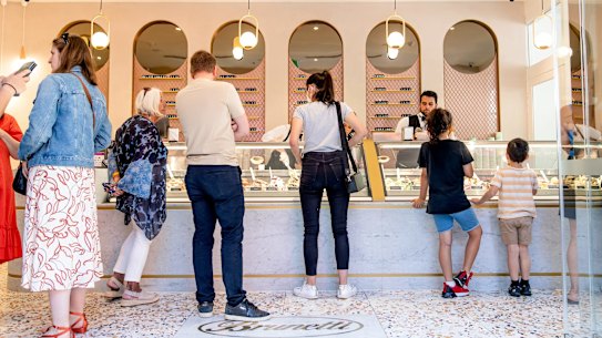 Stone and brass echo the glamour of the Brunetti Classico mothership next door.