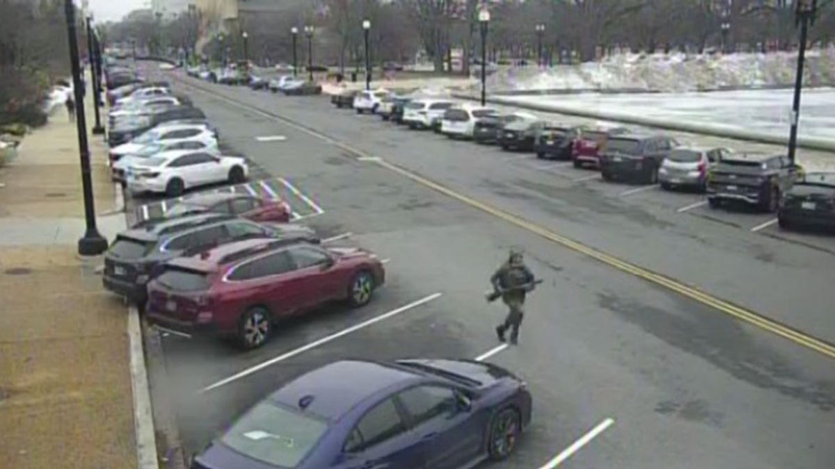 Security video of a man running with a shotgun near the Capitol