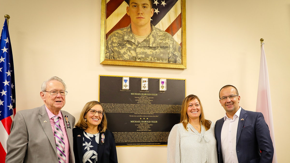 Michael Ollis' family visits a memorial tribute for him