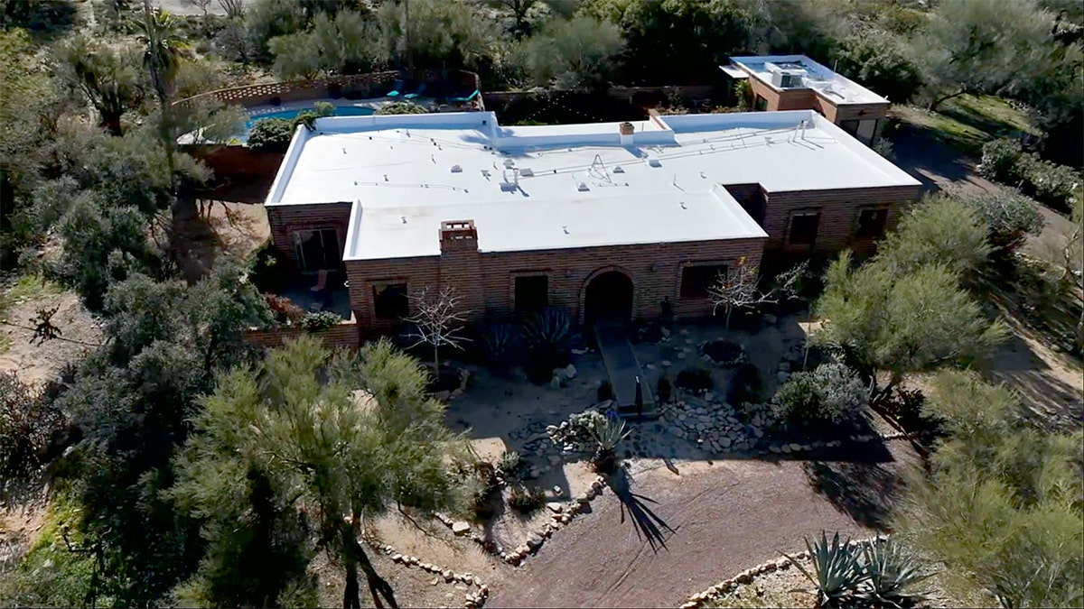 Nancy Guthrie’s house and surrounding property viewed from an aerial perspective.