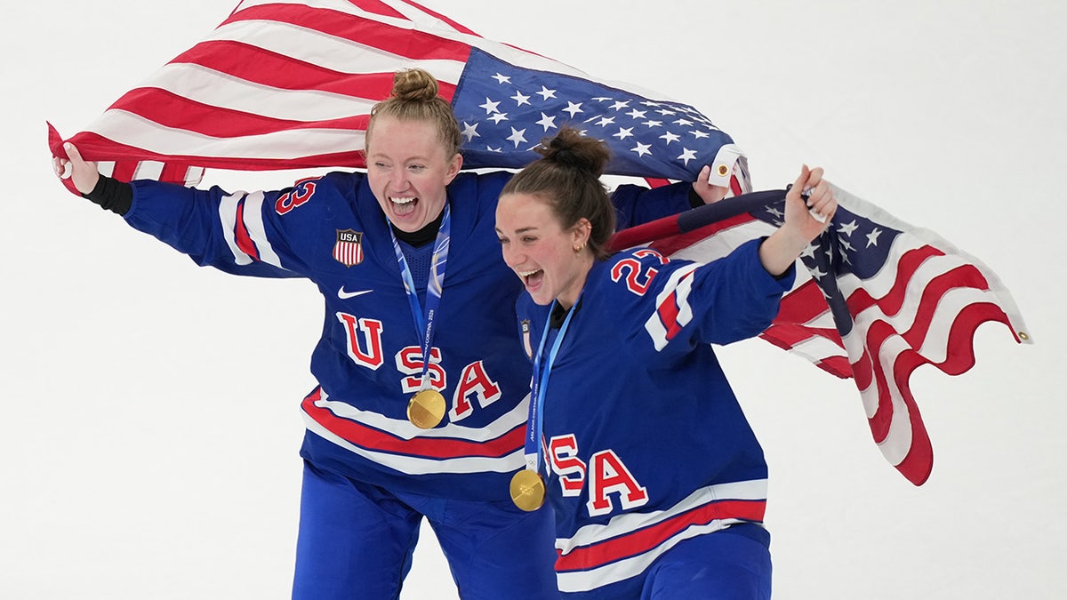 Grace Zumwinkle and Taylor Heise celebrate