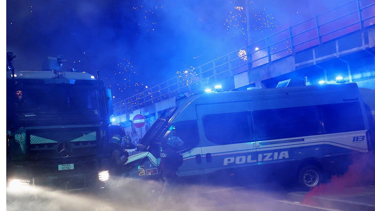 Fireworks explode near police vehicles