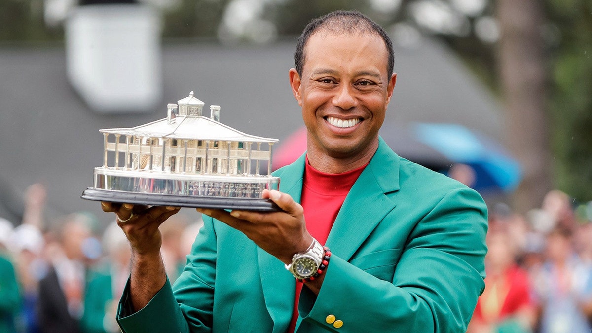 Tiger Woods celebrates