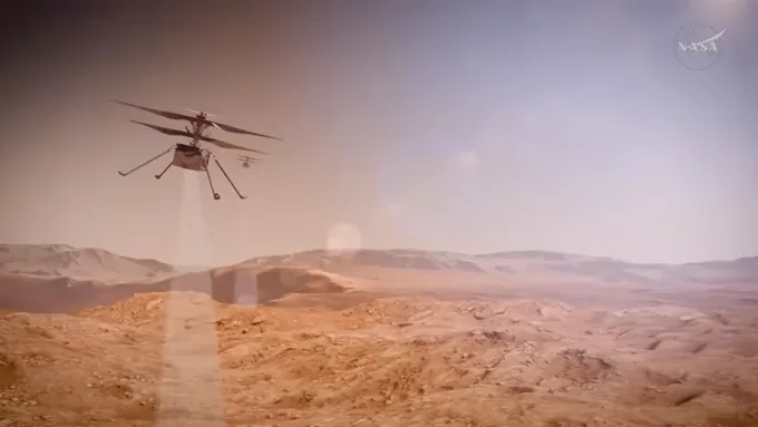 A rotorcraft is shown flying over the orange surface of Mars.