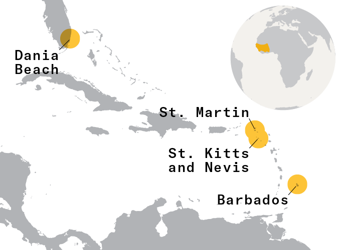 A map shows highlighted locations of Dania Beach, St. Martin, St. Kitts and Nevis and Barbados. In the corner is a globe which also has parts of West Africa highlighted.