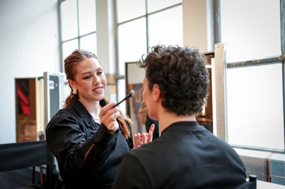 Meccaversity manager Amanda Liang hones her skills on Jack Craig before the opening of the training space. 