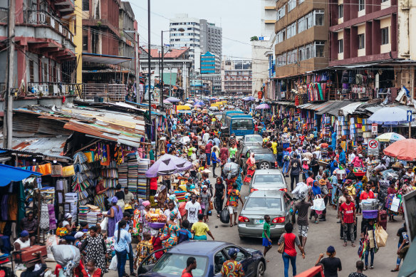 The two scammers were tracked down to a crowded slum in Lagos, Nigeria, where they were arrested.