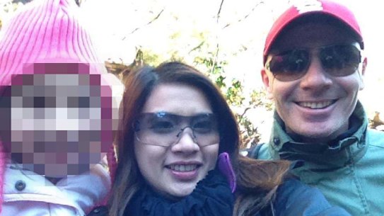 Sutasinee McGuigan (centre) and husband Patrick McGuigan. 