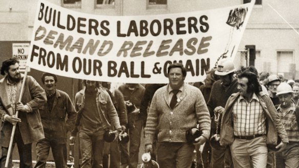 Joe Owens (right) and Norm Gallagher (centre) in 1974, leading a protest outside the Industrial Court.