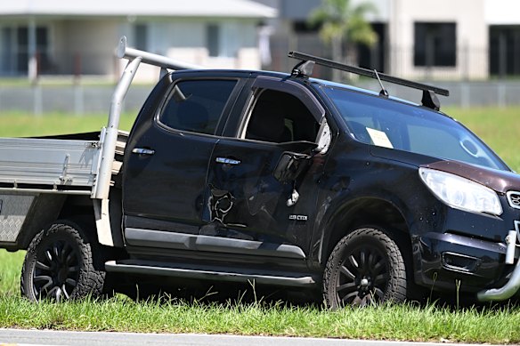 A damaged black ute was spotted on the street near Belivah Road, Belivah.