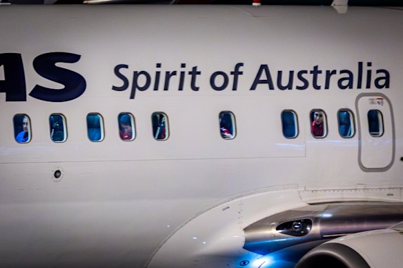 Players onboard the Qantas flight that took them from the Gold Coast to SYdney.
