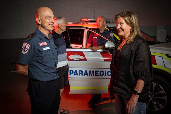 Ambulance Victoria MICA paramedics Stuart Morris (front) and Cam Asker, who took over from Glenn Miles in helping Hook. 