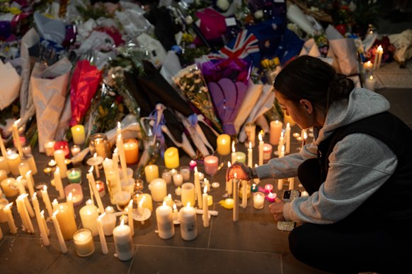 Candles are lit to honour Aidan Becker at Mernda vigil on Friday night.