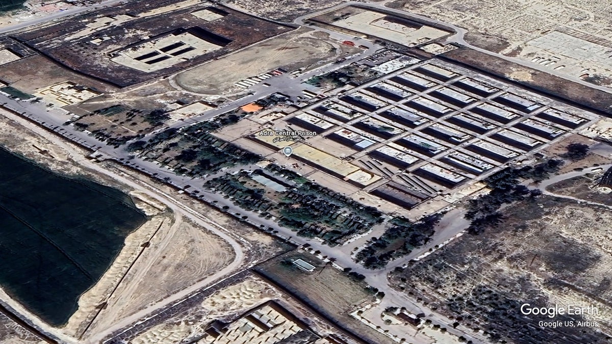 A high-altitude satellite view of Adra Central Prison in Damascus, Syria.