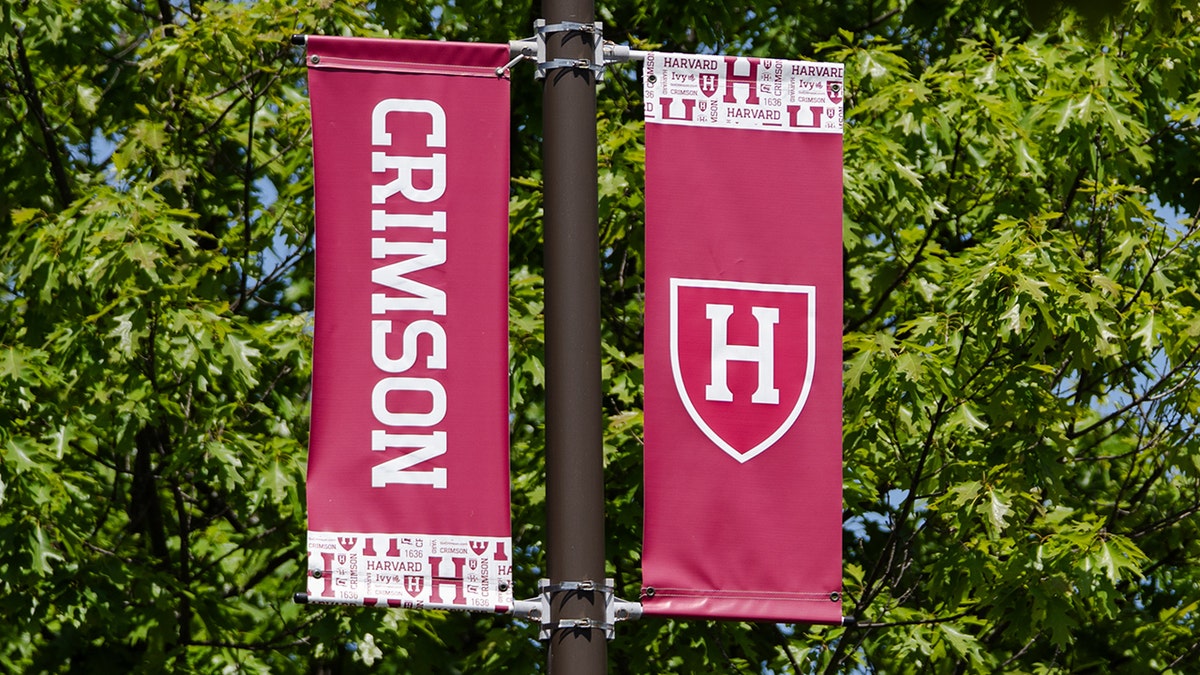 Sign that reads "CRIMSON" next to one that has an "H"