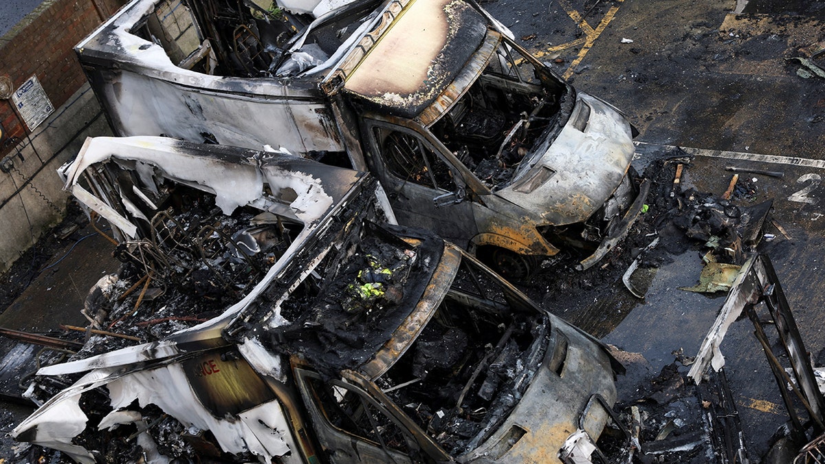 Ambulances seen damaged following reported arson attack in London