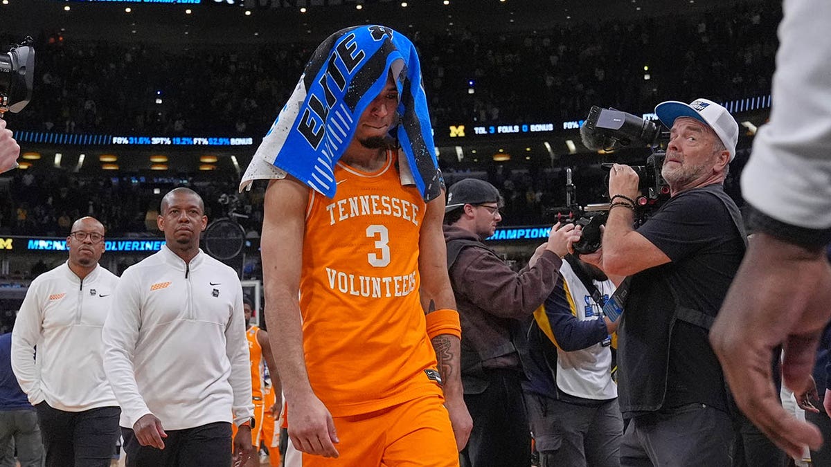 Bishop Boswell walks off the floor