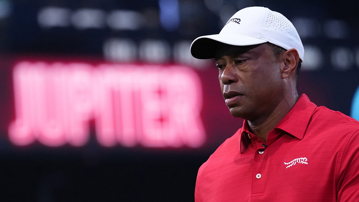 Tiger Woods looks on before a match