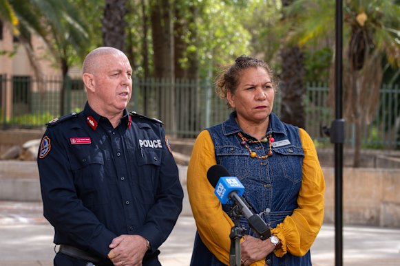 Northern Territory Police’s Peter Malley and Leanne Liddle outside the Alice Springs police station. 