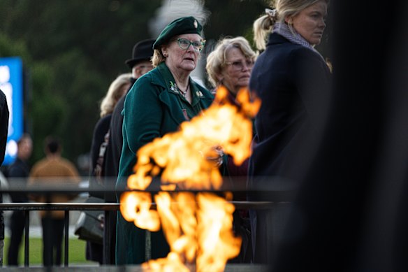 Paying respects at the eternal flame.